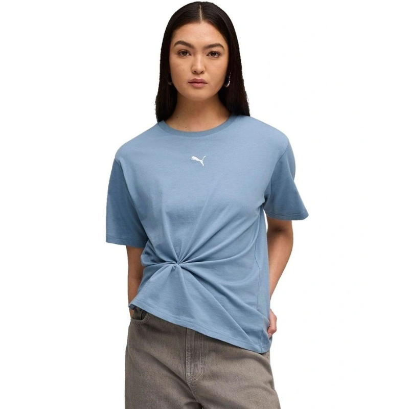 Woman wearing a blue t-shirt with a brand logo on a white background