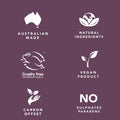 Set of icons and text on a purple background indicating 'Australian Made', 'Natural Ingredients', 'Cruelty Free International', 'Vegan Product', 'Carbon Offset', and 'No Sulphates Parabens'.