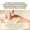 Hand applying foamy cleanser to skin with text about its benefits