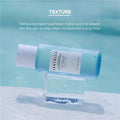 Skincare bottle with text on a blue background
