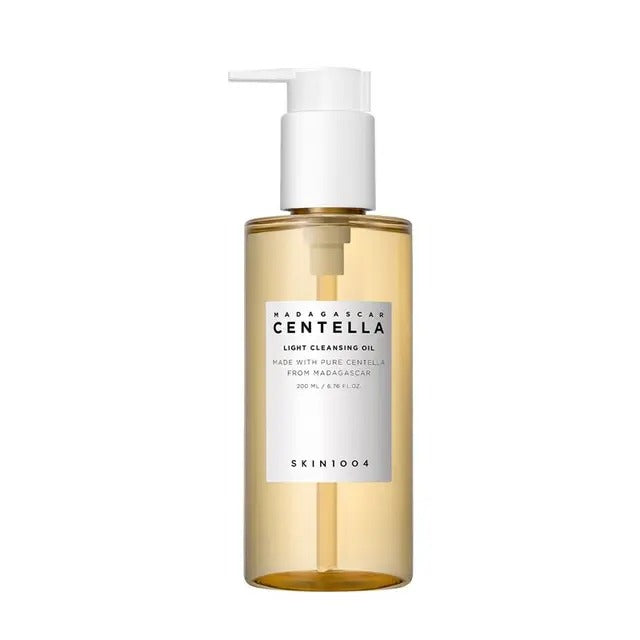 Bottle of Madagascan Centella light cleansing oil with pump on a white background