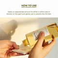 Gold bottle being used to apply a product to a cotton pad with text on how to use it.