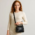 LeatherLuxe black leather handbag for women — elegant shoulder bag with premium finish and stylish gold accents