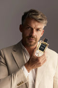 Virtue Eau De Parfum for men in sleek glass bottle with black label and cap, displayed with lifestyle shots and luxury background