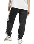 Adidas Essentials 3-Stripes Fleece Loose-Fit Joggers in grey, cozy casual pants with iconic side stripes, made from recycled cotton and polyester blend