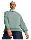 Puma Wardrobe Essentials Oversized Crew Sweatshirt in cotton-polyester blend with centered logo and ribbed cuffs