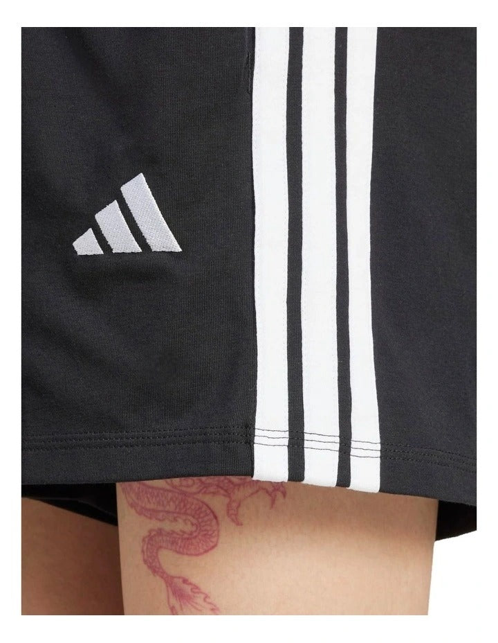 Adidas Essentials 3-Stripes Cotton Shorts in black with signature sporty side stripes, made from soft cotton and elastane for everyday comfort