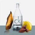 CK IN2U For Him Eau de Toilette 150ml sleek white and gold bottle