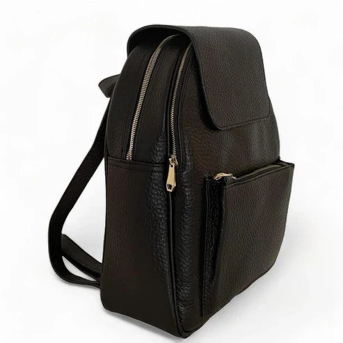 LeatherLuxe black leather women’s backpack with sleek minimalist design, adjustable shoulder straps, and gold hardware — perfect for work, travel, or everyday style.